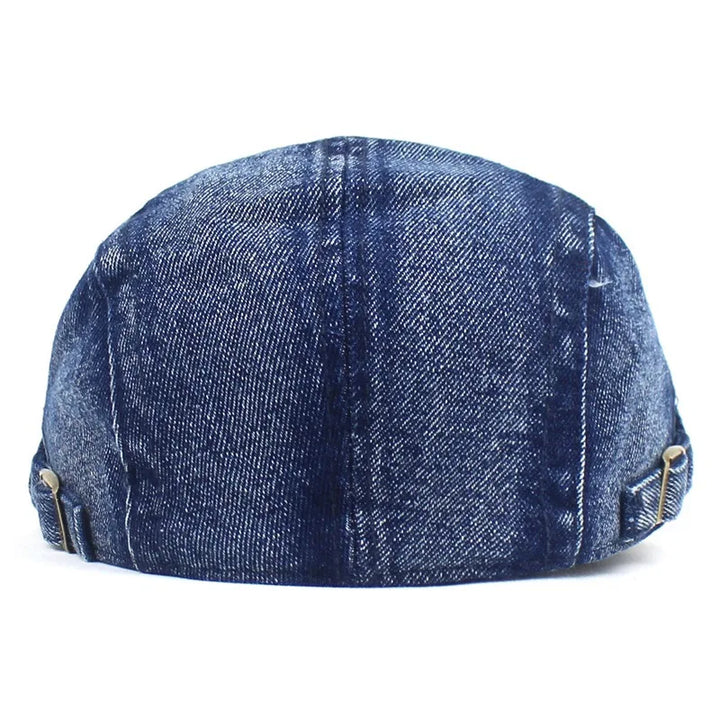 Women's stylish denim ivy cap, a fashionable flat peak hat for versatile everyday outfits.