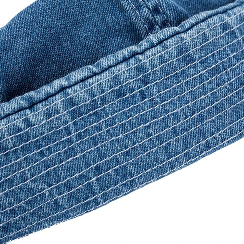 Modern unisex denim cap with a rolled brim. Elevate your casual and streetwear style with this adjustable hat.