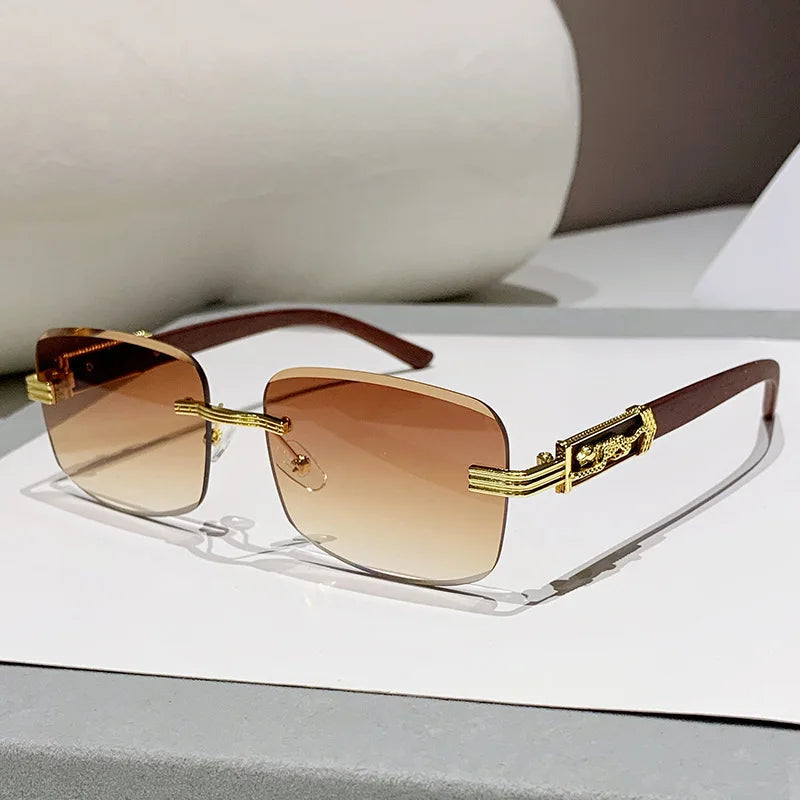 Fashionable unisex eyewear: designer rimless shades featuring gradient lenses and natural wood grain details.