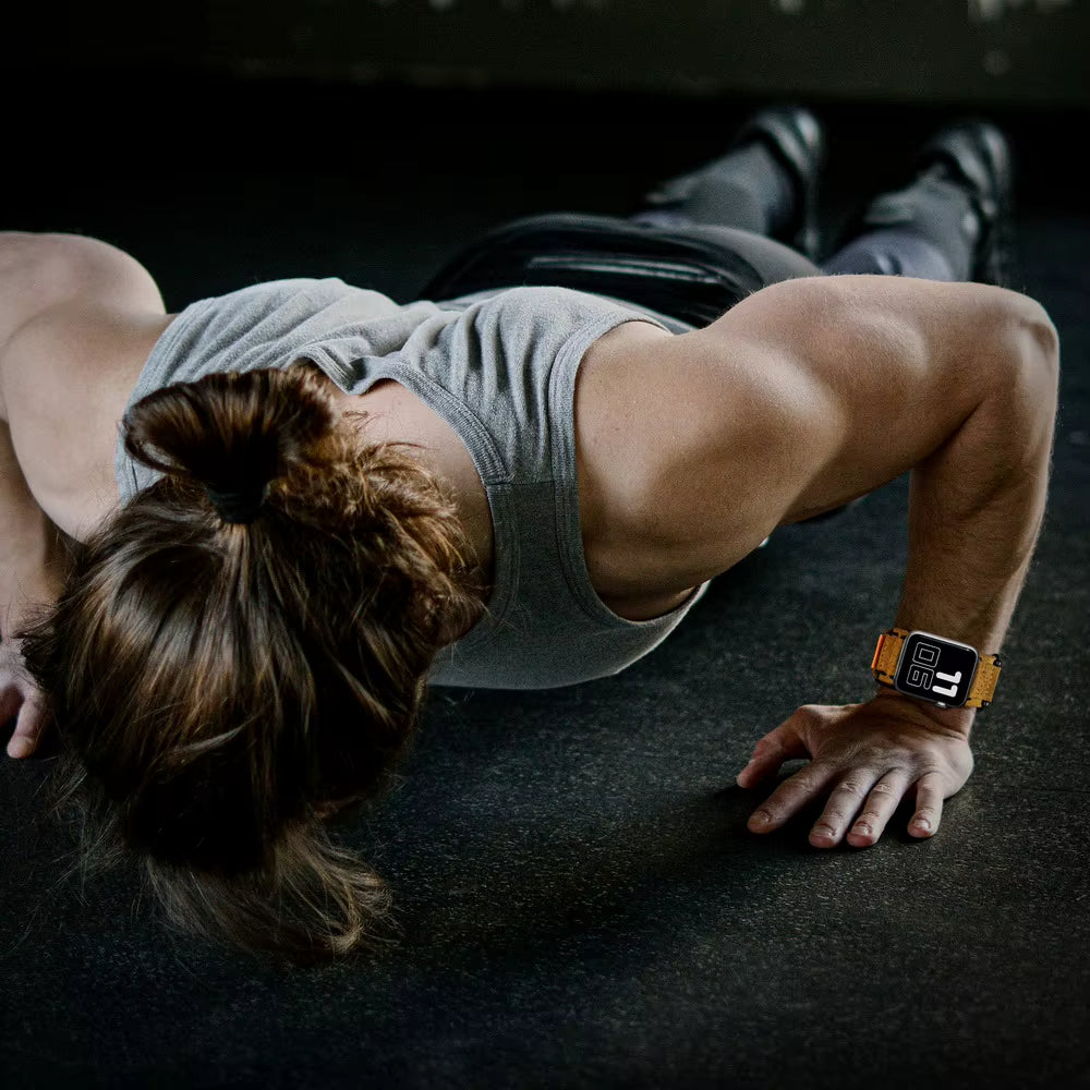 Stylish distressed suede Apple Watch band, a rugged unisex accessory with secure velcro strap.