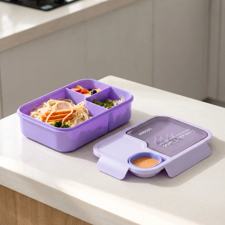 Durable silicone bento lunch box with removable dividers & utensils. Ideal for school, work & travel lunches.