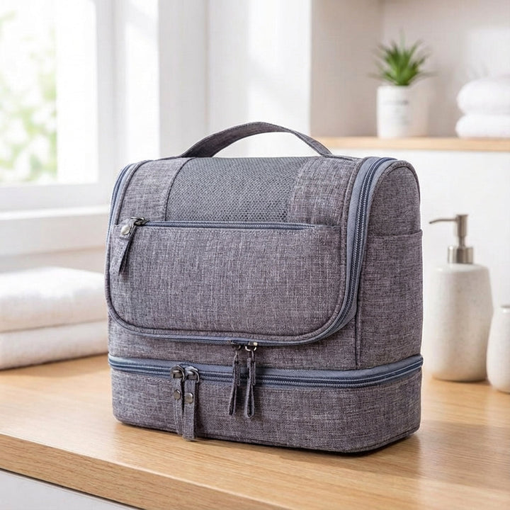 Unisex double compartment travel toiletry bag, waterproof, with hanging hook for easy access.