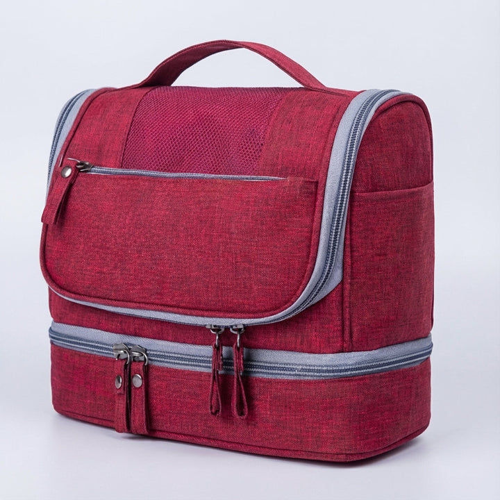 Durable, waterproof unisex travel toiletry bag with double compartments, ideal for organized packing.