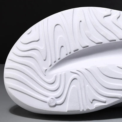 DRFT foam comfort slides, showing thick cushioned sole designed for lightweight, ultimate recovery & relaxation.