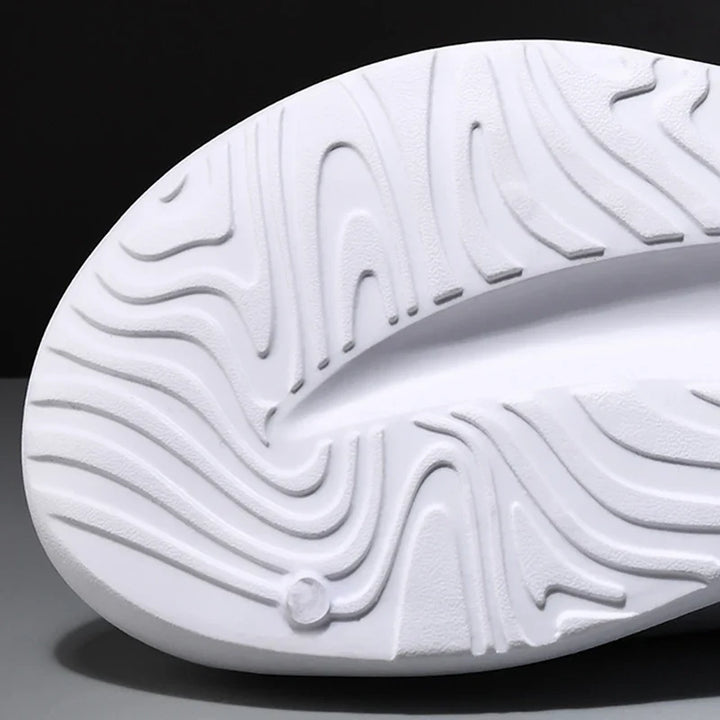DRFT foam comfort slides, showing thick cushioned sole designed for lightweight, ultimate recovery & relaxation.