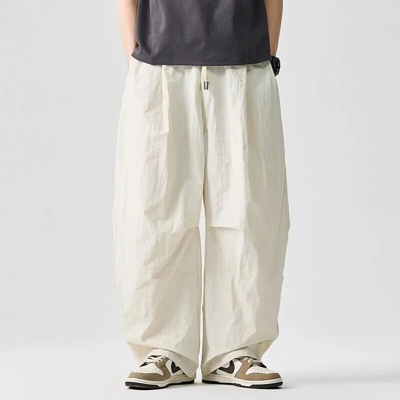 Driftline unisex relaxed-fit drawstring pants, perfect for warm weather comfort, streetwear, and everyday casual wear.