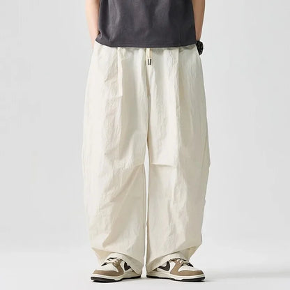Driftline unisex relaxed-fit drawstring pants, perfect for warm weather comfort, streetwear, and everyday casual wear.