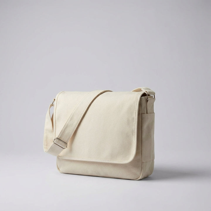 Stylish unisex canvas messenger bag, durable and versatile for travel, work, or daily essentials. Crossbody design.