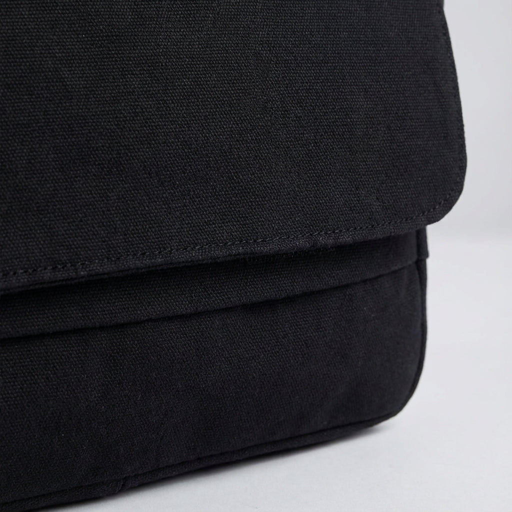 High-quality unisex durable canvas shoulder bag, ideal for men & women. Great for school, travel, or everyday carry.