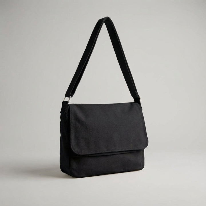 Versatile unisex canvas travel shoulder bag, ideal for work, school, or daily errands. Durable and comfortable.