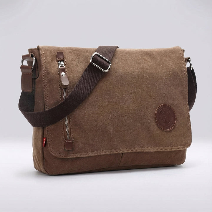 Rugged canvas messenger bag, a durable and versatile unisex everyday carry-all for any occasion.