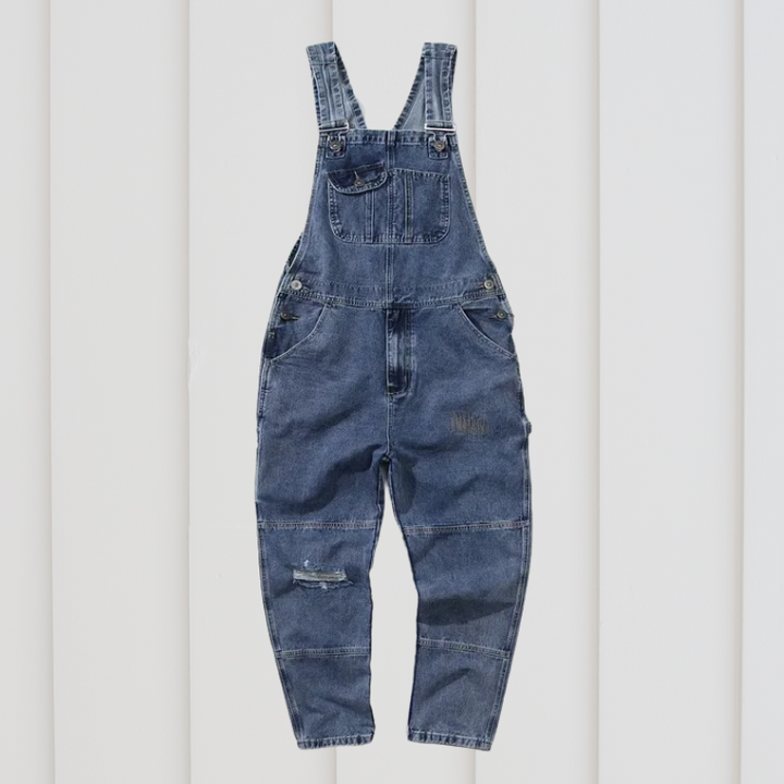 Model wearing unisex garden overalls, comfortable & durable for outdoor gardening.