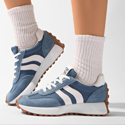 Breathable fabric texture on durable unisex comfort sneakers, perfect for activewear.