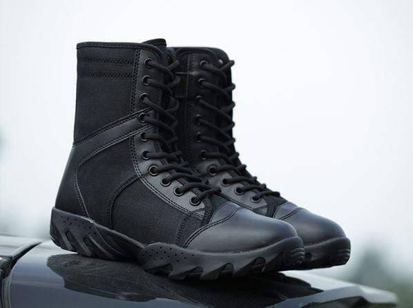 Side view of unisex durable winter boots, ideal footwear for cold weather hiking and adventure tracking.