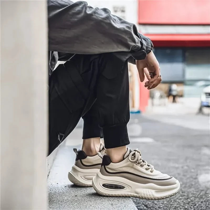Pair of Dynasty comfort sneakers, essential retro athletic shoes for casual wear.