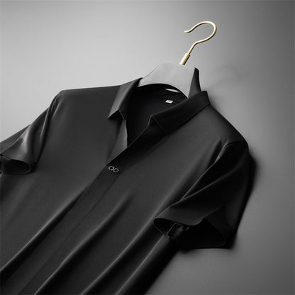 Modern elegance in a unisex set: Comfortable polo top and tailored pants for a sophisticated yet relaxed look.