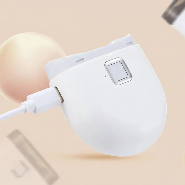 Achieve flawless nails with this electric nail care device. Unisex beauty tool for perfect home manicures.