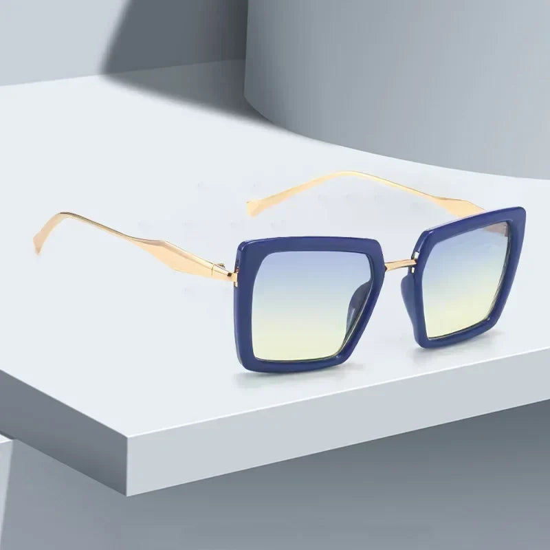 Modern unisex emerald frame square sunglasses with full UV protection, featuring stylish gold accents & square lenses.