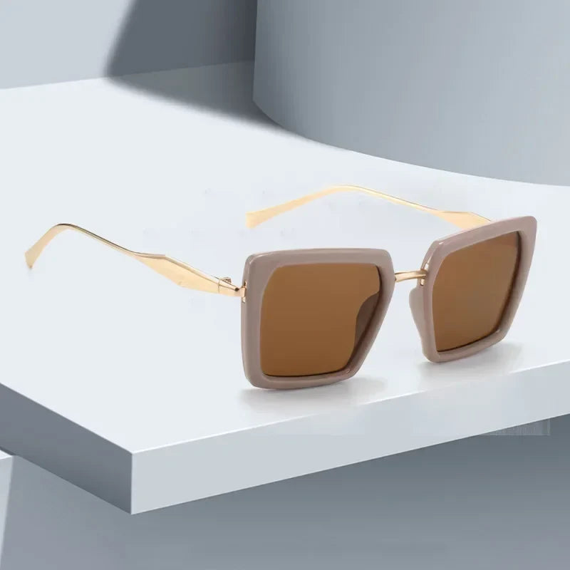Emerald frame square sunglasses for unisex wear, featuring sleek gold accents, combining modern style & UV protection.