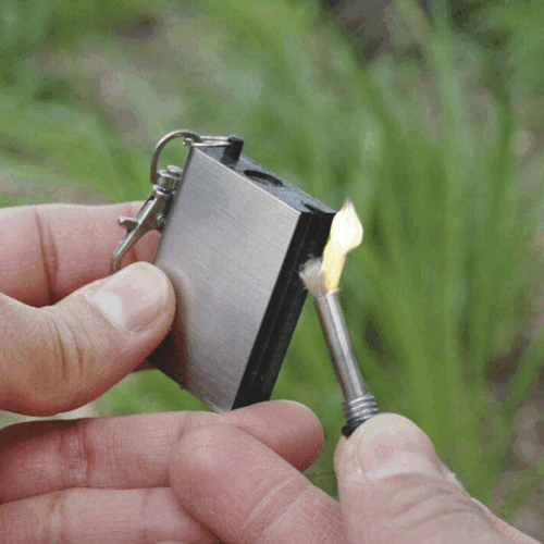 Durable survival tool: flint match lighter with secure cap, ideal for camping gear