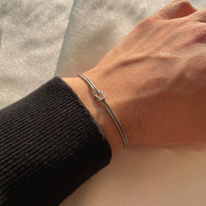 Adjustable stainless steel Endless Knot chain bracelet, sleek minimalist jewelry for men and women, thoughtful gift.
