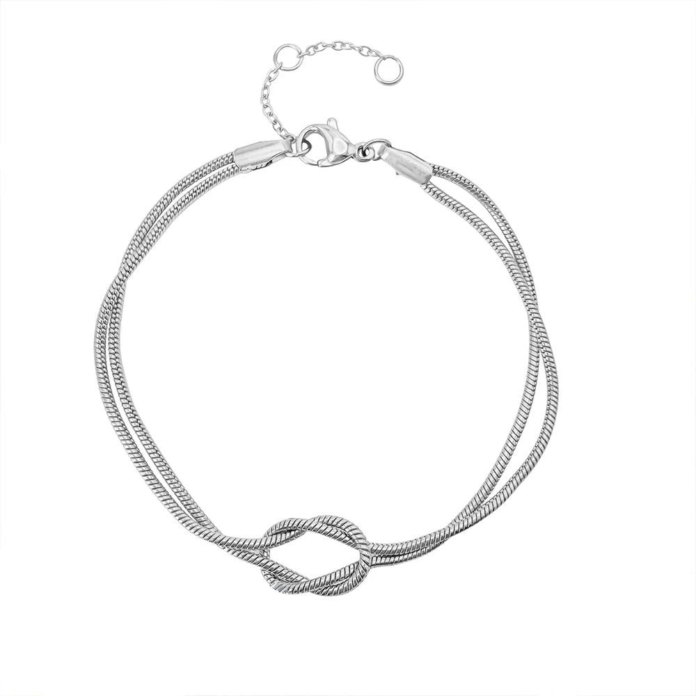 Versatile Endless Knot stainless steel chain bracelet, unisex adjustable jewelry with a symbolic minimalist design.