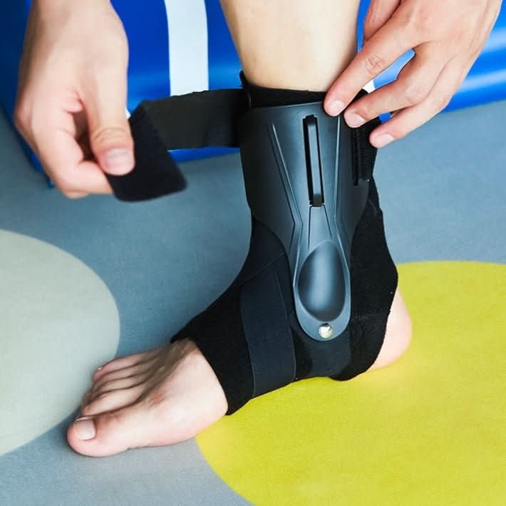 Unisex ergonomic ankle support with double stabilizers for joint stability & sports protection.