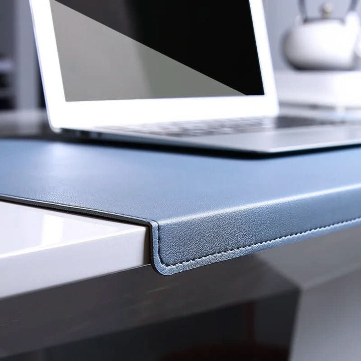 Comfortable PU leather ergonomic desk pad with integrated wrist support. Reduces strain for long working hours.