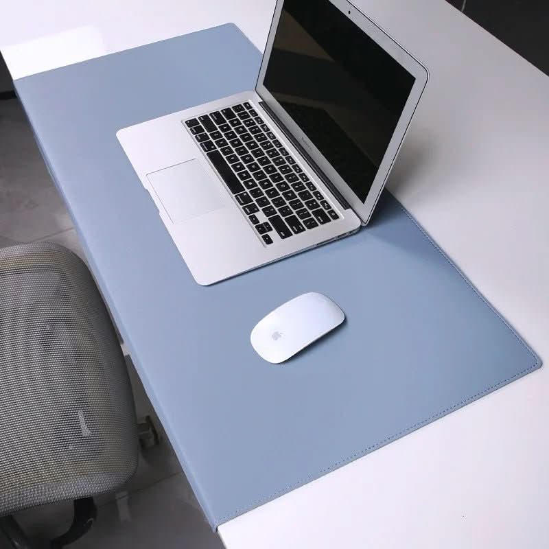 Non-slip PU leather desk mat protects your workspace. Features ergonomic wrist support for enhanced productivity.