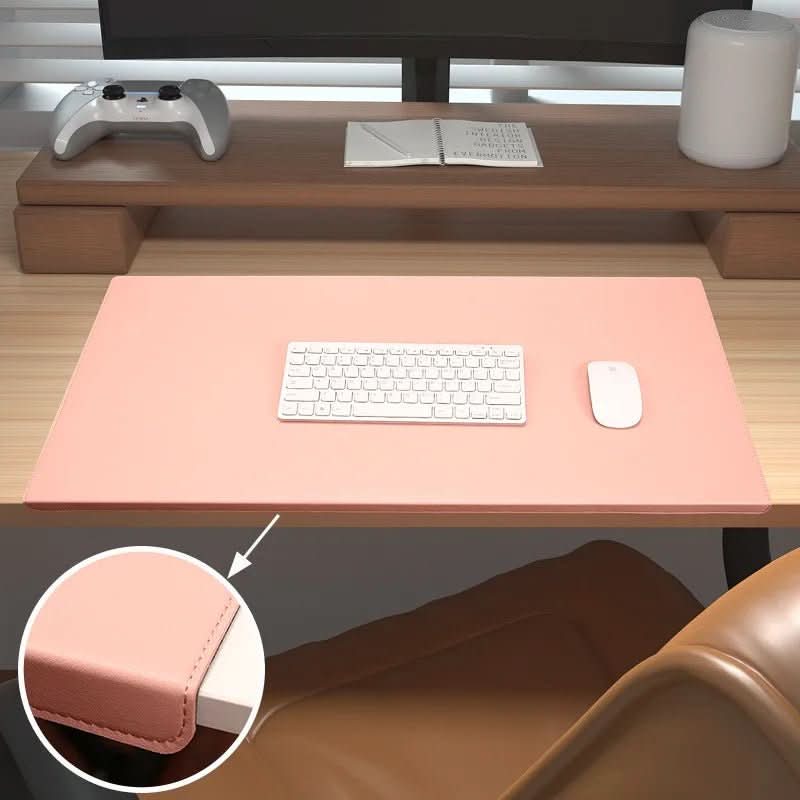 Stylish ergonomic PU leather desk mat with wrist support. Perfect for an organized home office computer setup.
