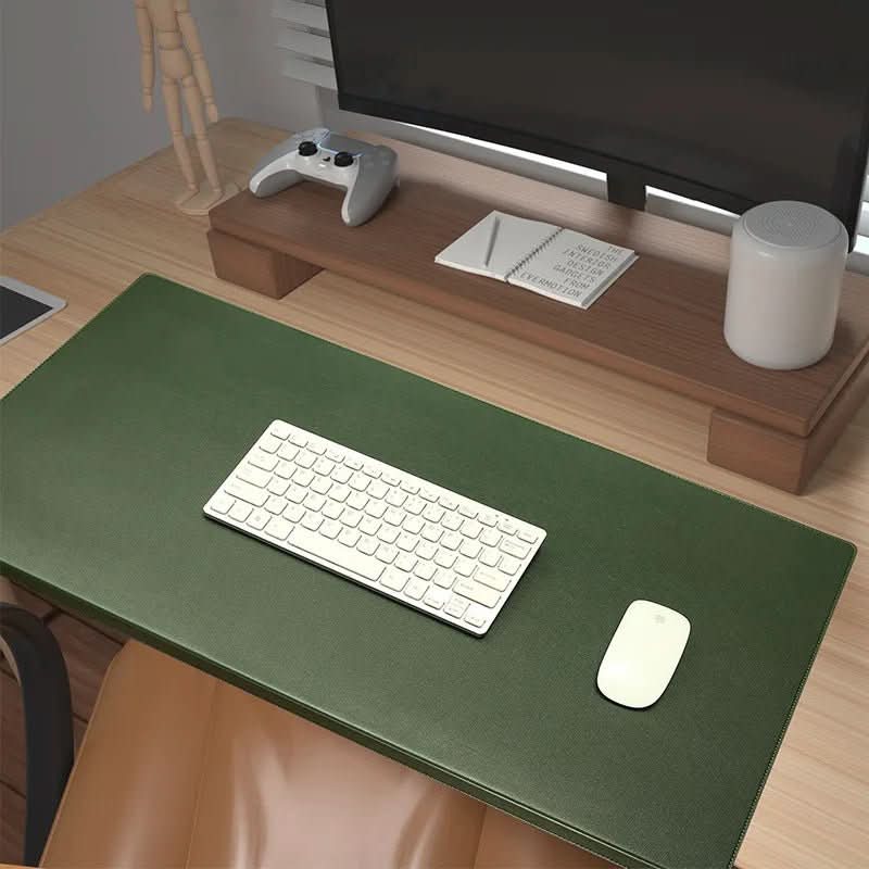 Boost productivity with this ergonomic PU leather desk mat, featuring soft wrist support for improved comfort.