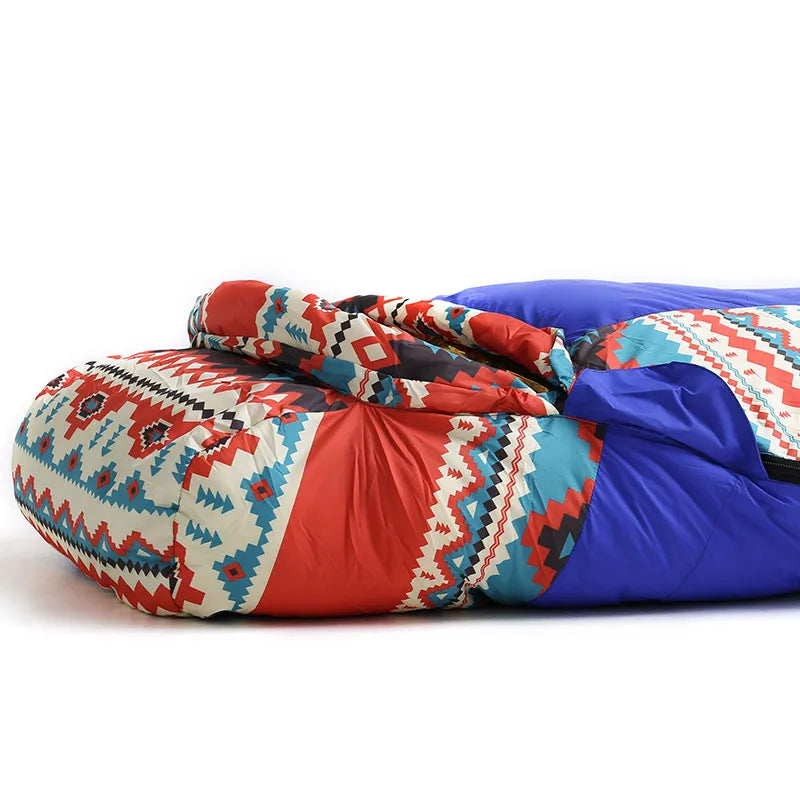 Portable ethnic style down sleeping bag on a hiking backpack, outdoor equipment