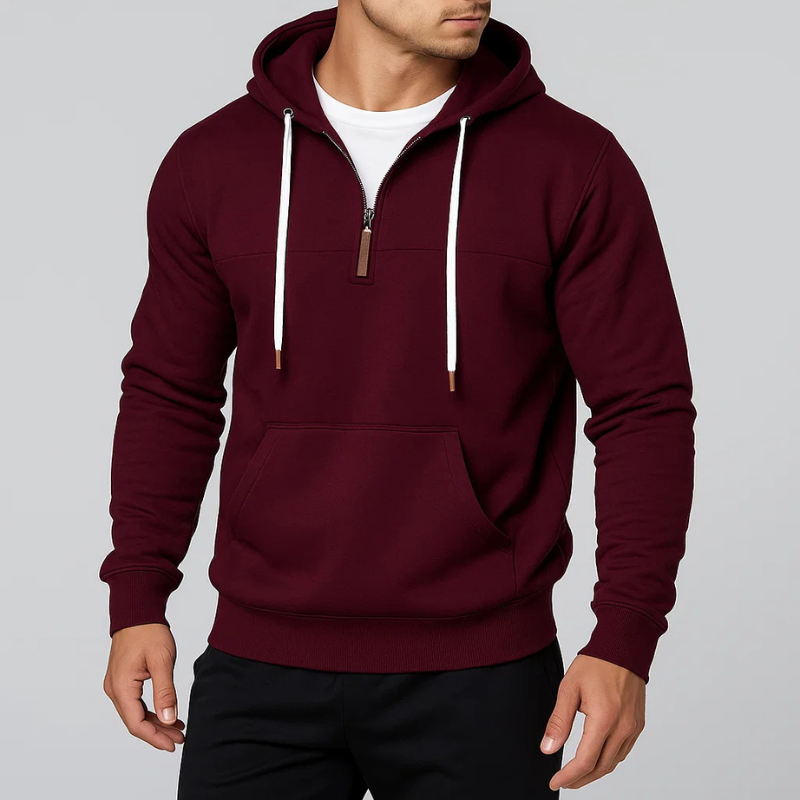 Modern unisex pullover hoodie with a half-zip design, offering casual everyday style & warmth.