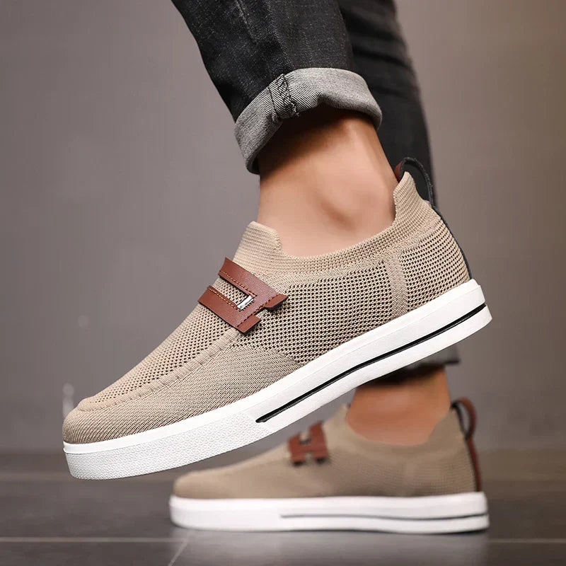 Comfortable slip-on shoes with breathable mesh upper, designed for everyday wear. Unisex casual footwear.