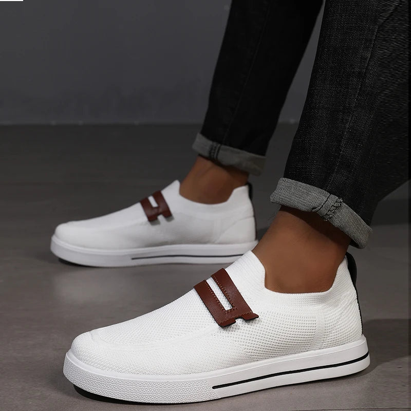 Casual unisex slip-on shoes featuring a breathable mesh design for all-day comfort and support.