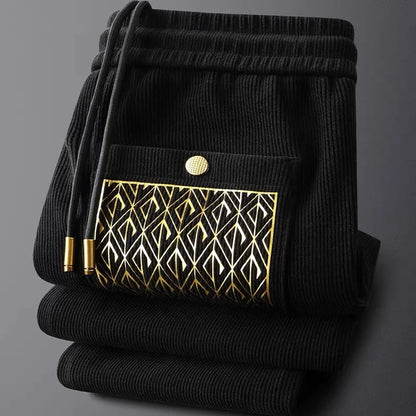 Stylish unisex comfort trousers with luxe gold drawstring tips & zipper accents, perfect for everyday.