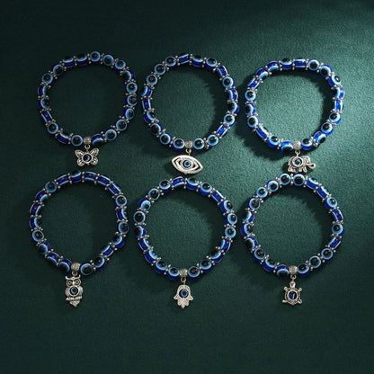 Unisex symbolic Evil Eye charm anklet for protection & style. Blue beaded spiritual stretch fit jewelry gift idea.