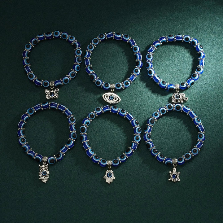 Unisex symbolic Evil Eye charm anklet for protection & style. Blue beaded spiritual stretch fit jewelry gift idea.
