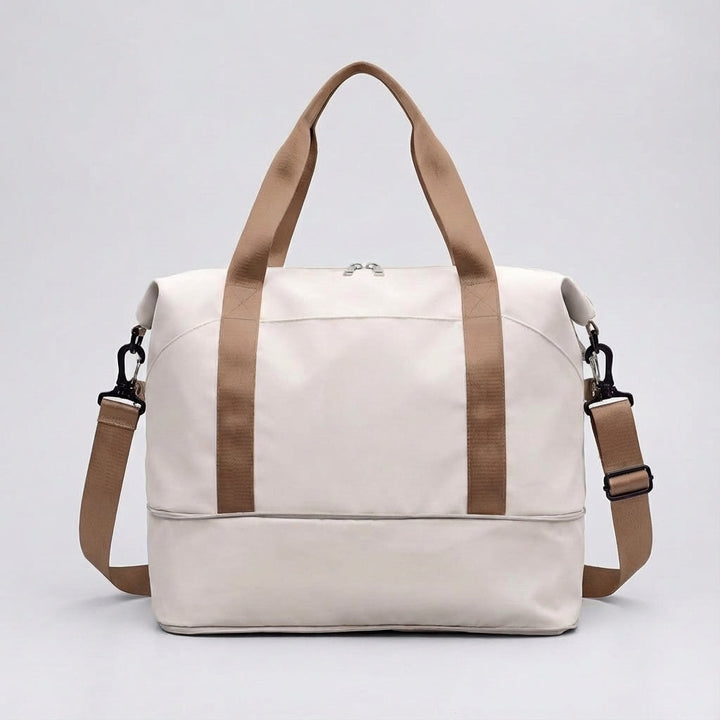 Expandable waterproof duffel bag, providing extra space for longer trips. Perfect for easy travel.