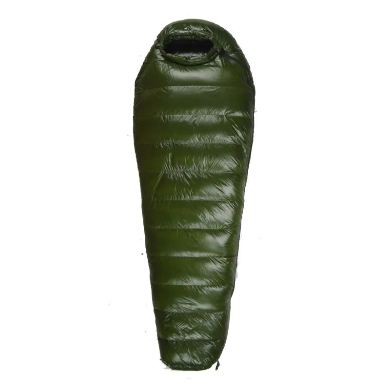 Someone zipping up the Unisex Extreme Weather Down Mummy Sleeping Bag, demonstrating ease of use in cold weather camping