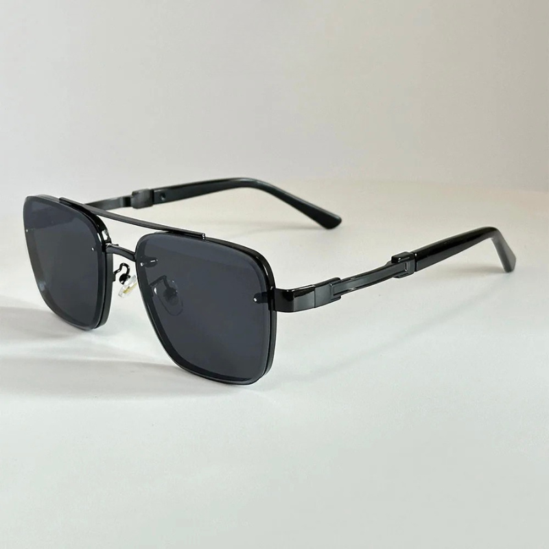 Sleek metal frame sunglasses for men and women, providing 100% UV eye protection.