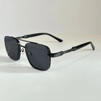 Sleek metal frame sunglasses for men and women, providing 100% UV eye protection.