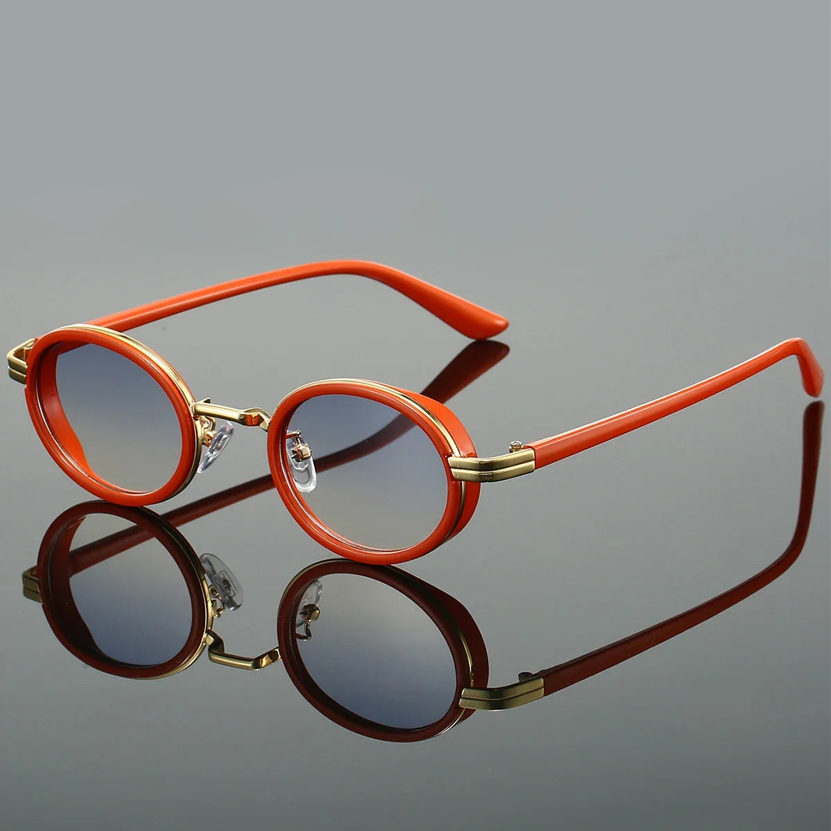 Unisex fashion round sunglasses with black frames, offering trendy eye protection and a stylish accessory.