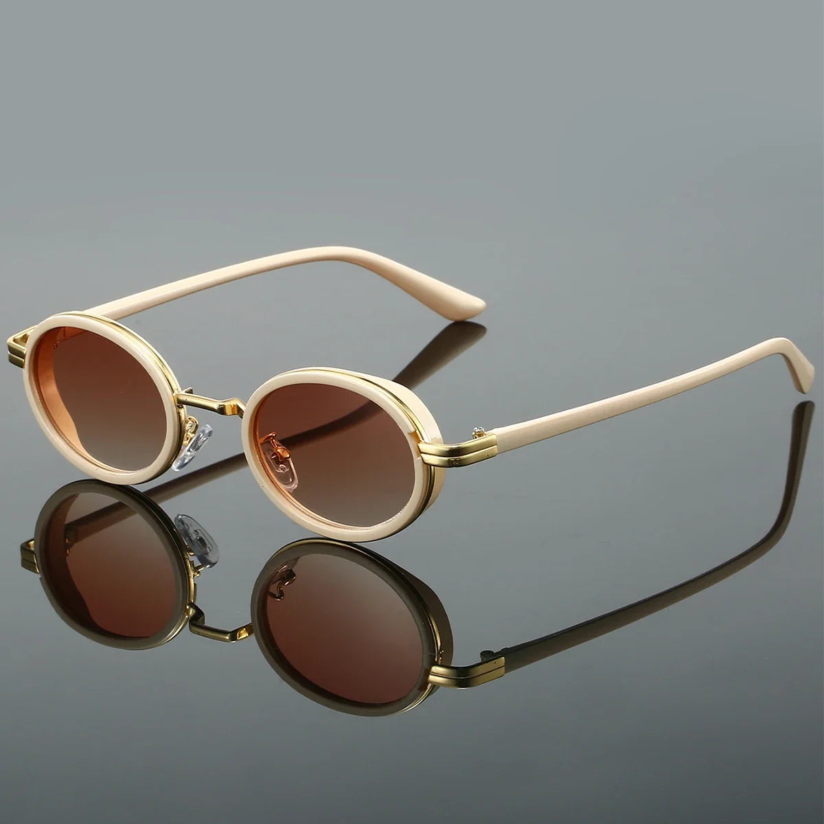 Sleek unisex round sunglasses with dark lenses and lightweight frames, perfect for stylish everyday eye protection.