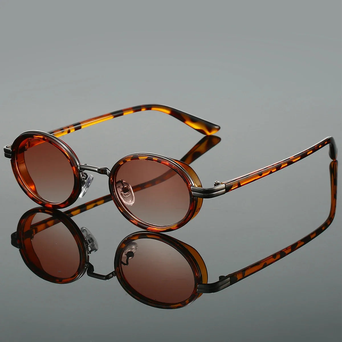 Modern unisex round sunglasses, a trendy fashion eyewear accessory for stylish protection and a contemporary look.