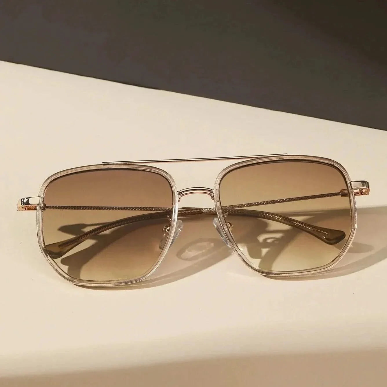 Stylish metal frame sunglasses, unisex design, offering superior UV protection for outdoor wear.