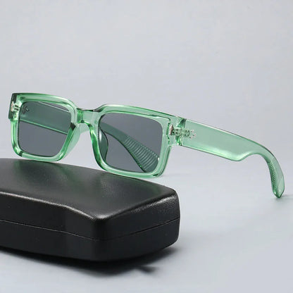 Model wearing chic unisex leo print sunglasses, a must-have fashion accessory for sunny outdoor adventures.