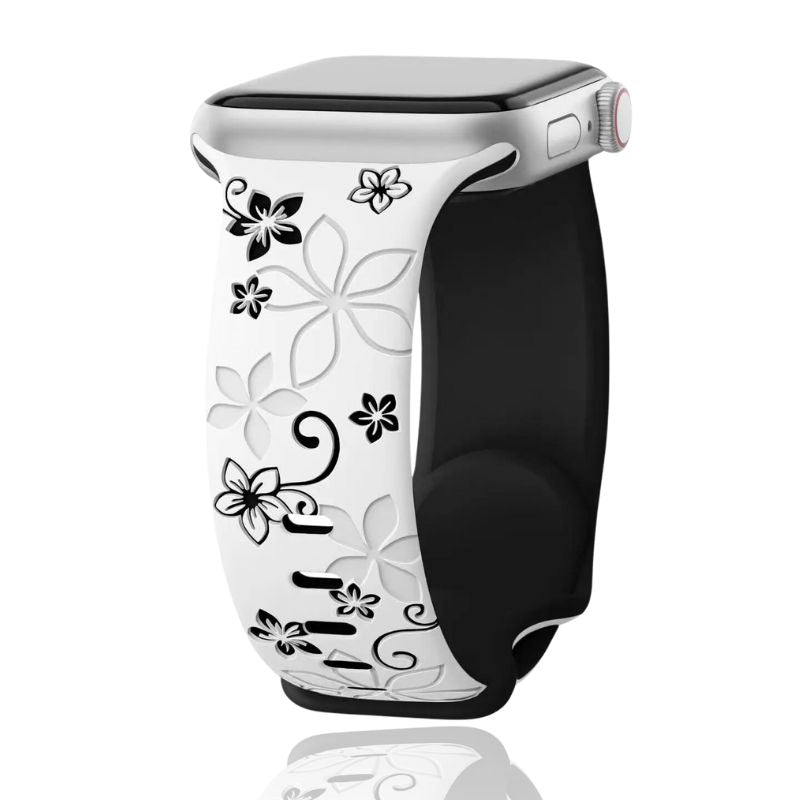 Unisex silicone smartwatch band with a floral engraving, comfortably worn on a wrist for everyday fashion.