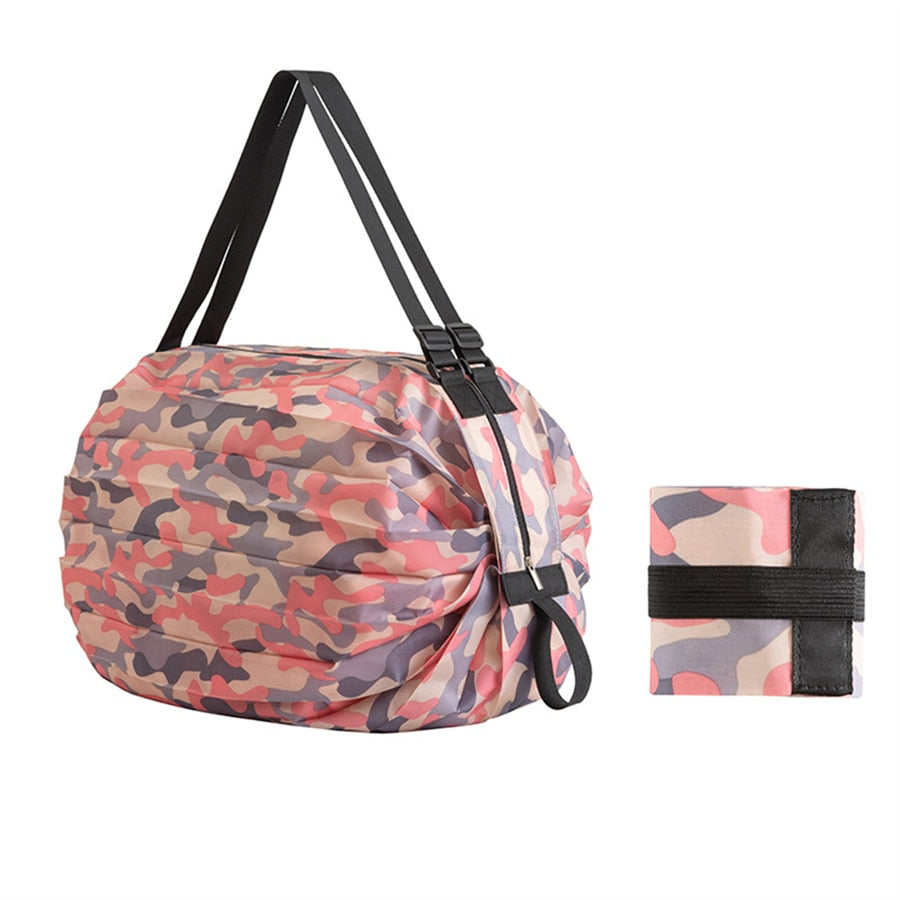 Large foldable shopping tote bag filled with groceries, showcasing its huge capacity and strong design.