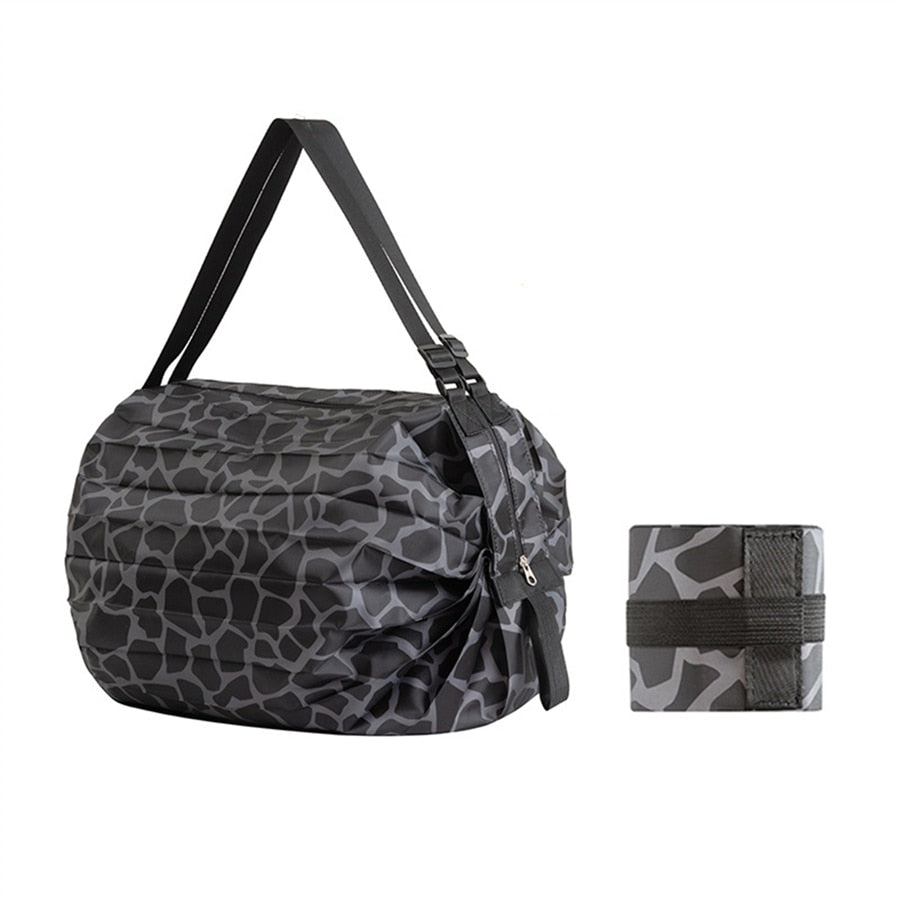 Eco-friendly reusable tote bag, a foldable Oxford fabric shoulder bag for sustainable daily shopping.